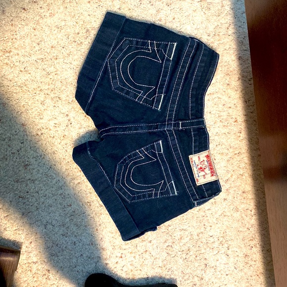 True Religion shorts in size 26. Dark blue, rhinestone, and cuffed. - Picture 2 of 3